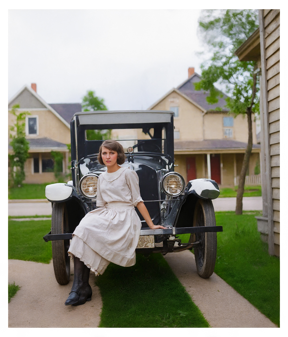 hyper photo restoration of young lady sitting on a car
