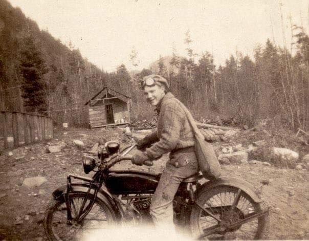 Digitally Restore Old Photos Without Losing Their Soul 1 old photo of a guy on a motor bike before a photo restoration