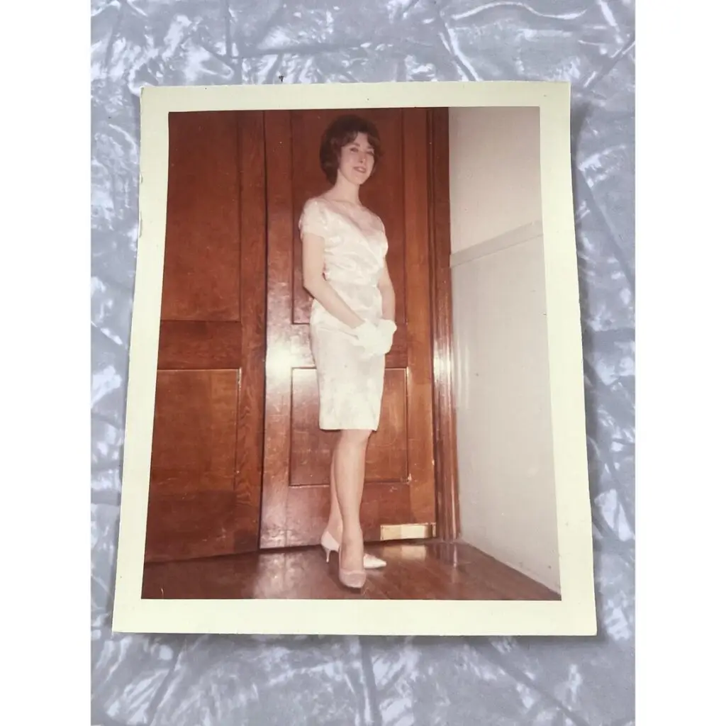 Photo restoration of the month for July 1 Photo of a photo lady standing there. This would be the photo restoration of the month for July